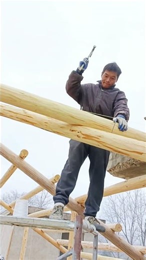 Traditional Construction: Nailing a Log Roof Structure