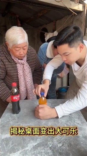 A large Coke appears on the table. #MagicTutorialUnveilingTheSecretOfMagicCokeOnTheTable#MagicTut...