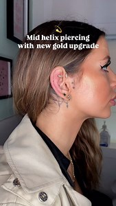 💫Mid helix piercing with our new gold upgrade available ✨ Pierced by @sacred.needle ⠀ You can BOOK ONLINE NOW! ▾ Link in bio! ▾ @undergroundtattoos_enfield Walk-ins available ⠀ #piercings #piercing #earpiercings #earpiercing #earpiercingideas #earpierced #londonpiercer #londonpiercing #piercingideas #conchpiercing #midhelix #helixpiercing #earpiercings #piercer #pierced #Enfield #london | Underground Tattoos Enfield