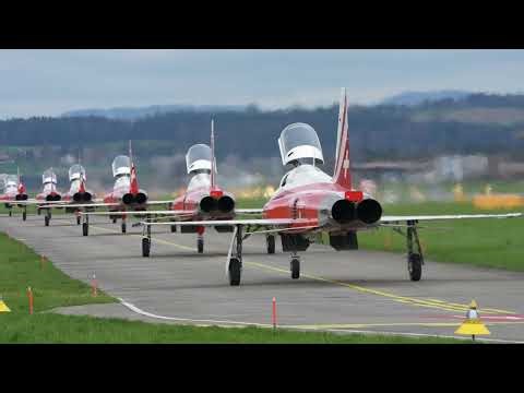 Emmen Air Base Patrouille Suisse fighter jets taking off and landing on a winter day.