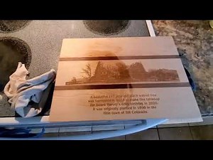 Applying mineral oil to a custom cutting board