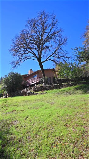 JUST LISTED! ($599,000) — Welcome to 23188 Cottage Hill Drive, Grass Valley! Set on 10 stunning acres with year-round Wolf Creek frontage, this well-maintained 2-bedroom, 2-bath home offers peaceful country living with panoramic views in every direction. Located in a great neighborhood of sprawling acreage properties, just off Highway 49 for an easy drive to Grass Valley or Auburn. Enjoy direct access to the creek, where level areas provide the perfect spot for relaxing, entertaining, or simply 