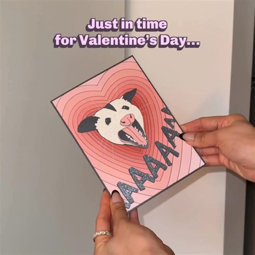 Our newest pop-up card features two adorable possums, a heart-covered garbage can, and a whole lot of chaotic love energy complete with glitter details. It’s a card made for your weirdest, most wonderful connection. So whether it’s your partner, your bestie, or the one who makes every moment a little more unhinged - this Valentine’s Day, send them something as gloriously offbeat as your love. | Lovepop Cards