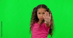 Stop hand, child portrait and green screen with anger and no emoji sign. Children, open palm and protest feeling upset with warning with kid doing rejection, defense and refuse hand gesture of girl