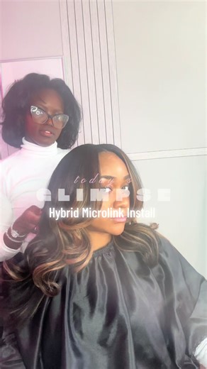 Hybrid microlink install with microlinks placed in the front and a sewn foundation in the back for structure and longevity. Leave out around the perimeter allows versatility including ponytails and up styles while maintaining a seamless blend. Two 16 inch kinky straight bundles straight from my collection used to create natural natural density and effortless movement. Custom peekaboo color was added and placed strategically to enhance dimension without overpowering the look. I do not often offer