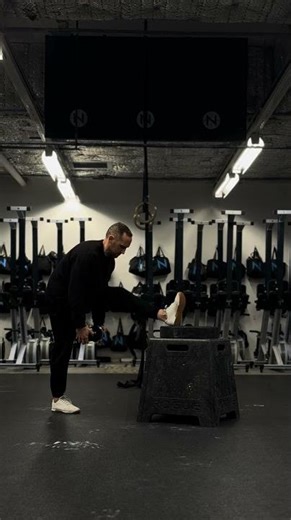 Standing Weighted Single Leg Dynamic Hamstring Stretch