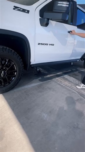 Ultimate truck upgrades — power steps for easy access and a truck bed cover for protection! #silverado #chevytrucks #2500hd #trailboss | Truck Access Plus