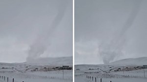 Farmer spots 'snow devil' tornado tearing through Scottish field as he feeds his sheep, while Brits shiver in freezing cold | LBC