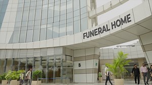 People entering the FUNERAL HOME building | Premium Stock Video Footage