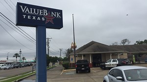 Police are searching for suspect in bank robbery