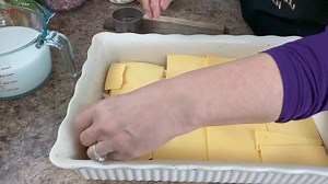 This weekend…stir this up today and bake in the morning! Ham & Cheese Strata! HAM & CHEESE STRATA 12 slices of white bread 3/4 pound of American Cheese Slices 10 ounce pkg. frozen chopped broccoli, cooked & drained 2 cups finely diced cooked ham 6 beaten eggs 3 1/2 cups milk 2 Tablespoons dried minced onion 1/2 teaspoon salt 1/4 teaspoon dry mustard 1/4 cup shredded cheddar cheese, optional Lets Make it- Cut 12 circles from the bread slices using a biscuit cutter or glass. Fit the scraps into th