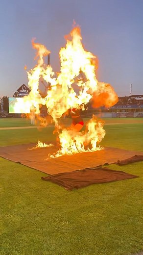 I bet you’ve never seen this at a baseball game before!?🔥 I love hearing the roar of a crowd after a giant burn off!! Thanks West Michigan @whitecaps for having me out💙 Kicking off the summer with a bang! I’m so excited to bring the heat to Baseball this year! Click the link in my bio to see what teams I’ll be performing for.. If you don’t see your local team.. send them this video and tell them you want to see me there! 😉🔥 Costume by @minneymillercostumedesigns ❤️ #baseballperformance #fire