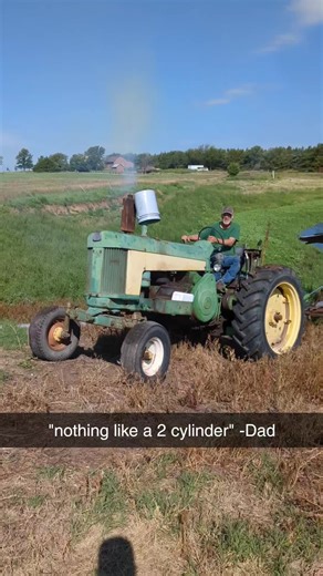 Pulling the irrigation pump out of the pond with the JD 730!