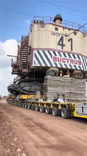 moving a giant machine weighing 1420 tons #excavators #crawler
