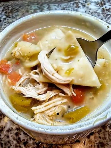 Green Chile, Chicken & Flour Tortilla Dumpling Soup Ingredients: 4 tablespoons unsalted butter 4 tablespoons all-purpose flour 4 cups chicken broth (or stock) 2 cups whole milk (or half-and-half for extra creaminess) 1–2 cups water (as needed for consistency) 1 teaspoon chicken bouillon (or to taste) ½ teaspoon freshly cracked black pepper Salt, to taste 3 cups shredded rotisserie chicken 4–5 small flour tortillas, cut into 3×3-inch squares 1 cup roasted green chile (mild or hot, to taste) Optio