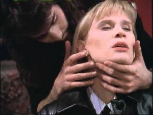 Vampire Vachon (Ben Bass) resists attacking officer Tracy Vetter (1995)