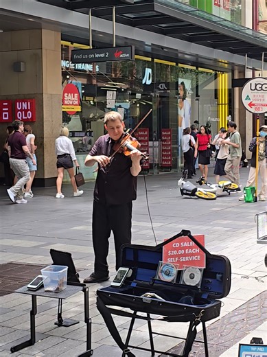 Talented Sydney Busker: follow for more #sydney content Pitt Street Mall is always full of talented buskers. You will get treated to singers, dancers, musicians and more. #musicians #busking #streetperformance #violinist
