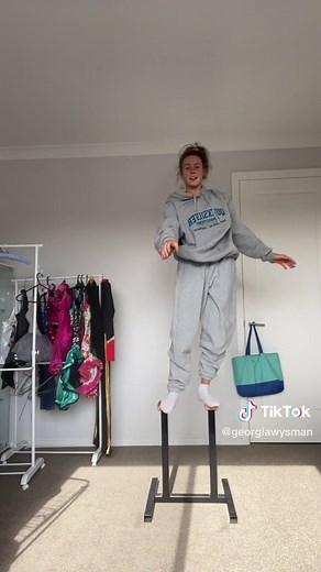 Gymnastic Skills on Parallel Bars Demonstrated