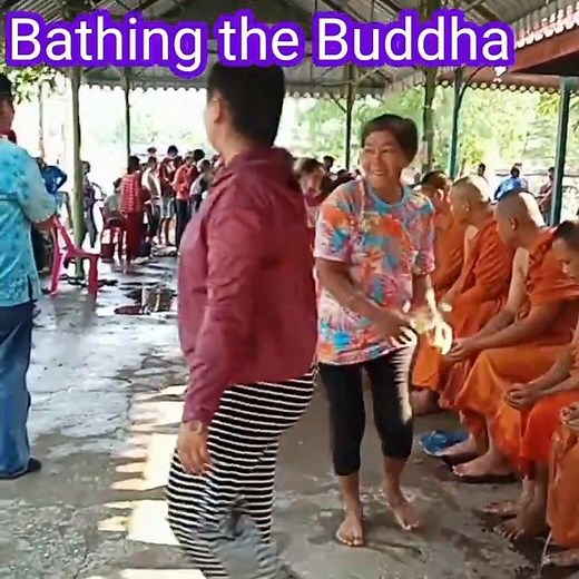 "Songkran Tradition: Paying Respect by Bathing the Monks"
