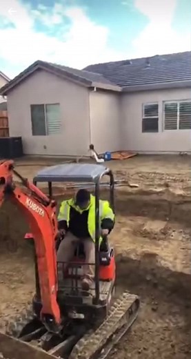 Kubota Mini Excavator Trench Digging in Backyard