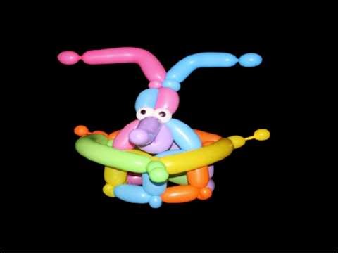 Learn how to make a crazy hat using balloon twisting and the Twisted Party Toppers Base Version 19