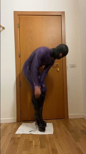 The Ritual of Height: Purple Catsuit & Stilettos #latexfashion #boots #highheels #purplelatex