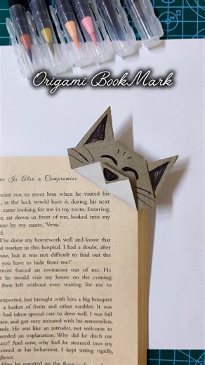 1.2K views · 16 shares | Cute Cat Origami Bookmark  | Easy Paper Craft for Book Lovers  #FacebookReels #TrendingReels #CraftLovers #ArtAndCraft #SimpleCrafts #CuteBookmarks #DIYProject #FunCrafts #HomemadeIdeas #CraftIdeas #DIYCrafts #PaperCrafts #OrigamiArt #EasyCraftIdeas #BookmarkDIY #CreativeIdeas #CraftInspiration #PaperFolding #HandmadeCrafts | Sajum Art | Facebook