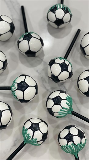 Dip'd N Drip'd on Instagram: "🍰⚽️ Hiii sweet friends! I made these adorable soccer ball cake pops for my nephews birthday and wanted to share the process! These are so fun! 🤩 Whether you’re gearing up for a match or just celebrating your love for the beautiful game, these treats are sure to score big with your friends and family! In this reel I transform plain white cake pops into the coolest soccer balls in grass!! 🥳✨ I used to dread making soccer ball cake pops until I mastered this techniq
