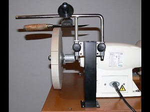 Sharpening Lucy's knife on paper wheels