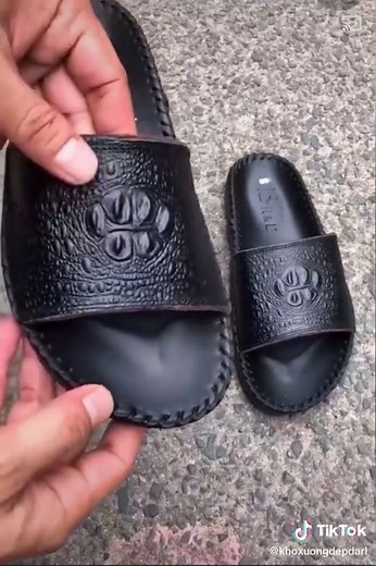 Stylish Black Leather Slides with Textured Detail