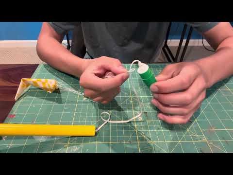 How to attach and replace recovery systems on a model rocket - NARTREK Junior Advanced Video