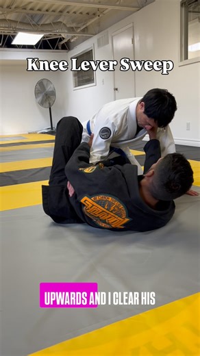Knee Lever/John Wayne Sweep from Half Guard