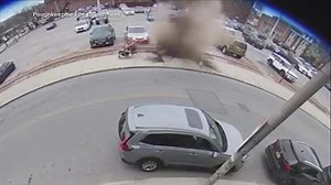 Video shows grandmother and kids narrowly miss exploding manhole