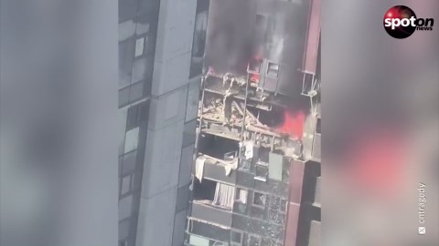 Gas explosion blows hole in luxury high-rise