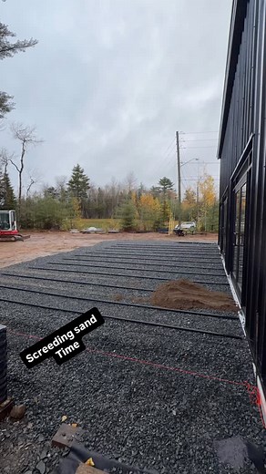 Screeding sand for pavers is a process of leveling a 1-inch layer of bedding sand on a compacted base, using screed pipes or bars as guides to create a smooth, even surface for laying pavers @unionbrewinginc | Brett Inc.