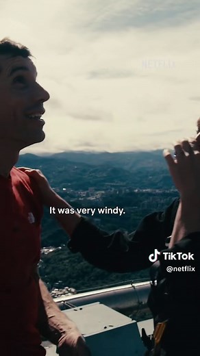 Alex Honnold and his wife Sanni kiss atop Taipei 101 after he completed his historic free solo climb #SkyscraperLIVE