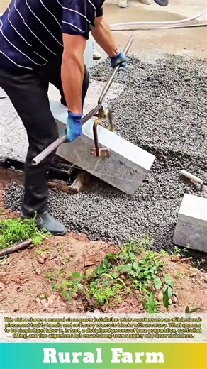 Manual Stone Paver Installation: Efficient Curb Placement Tool in Action Laying Heavy Concrete Block