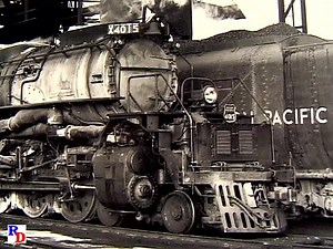 Here's a throwback... black and white footage and stills of Big Boy 4015 in the 1950s. She's pulling freight through a cut on Sherman Hill. From the documentary "Big Boy Collection" 𝗢𝗻 𝘀𝗮𝗹𝗲, $𝟭𝟬.𝟬𝟬 𝗼𝗳𝗳! https://rfd.video/BigBoyCollection | Railfan Depot