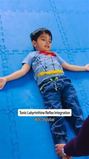 Dimensions Centre for Child Development on Instagram: "Slow, rhythmic back-and-forth movement isn’t “just play.” It’s nervous system work. The Tonic Labyrinthine Reflex (TLR) helps the brain understand gravity and body position. When it’s not fully integrated, children may struggle with: ▪️ Balance ▪️ Posture ▪️ Attention ▪️ Emotional regulation ✨ Supine rhythmic movement provides: ✔️ Predictable vestibular input ✔️ Deep calming regulation ✔️ Improved body awareness ✔️ A sense of safety in movem