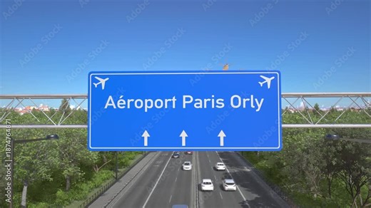 Blue motorway sign for Paris Orly Airport with an airliner flying above along the road toward the airport