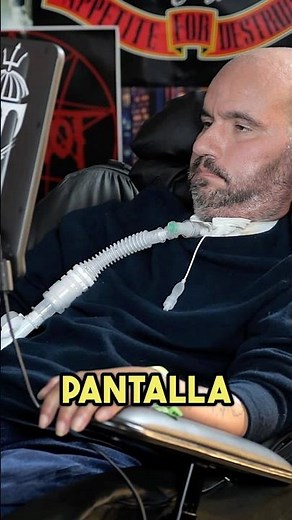 How does a person with ALS communicate?