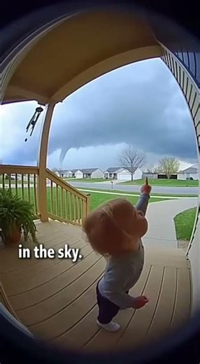Baby Points at Forming Funnel Cloud