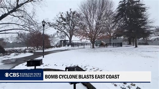 A bomb cyclone is hitting parts of the East Coast, bringing Arctic air and causing blizzard-like conditions. The Carolinas are seeing the worst of the weather, with some areas potentially seeing up to 18 inches of snow this weekend. | CBS Evening News