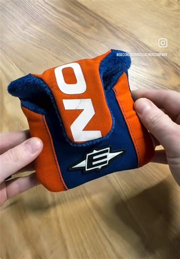 Total Synergy 🔋 Another incredible mallet putter cover out the door to a happy customer. Crafted from a pair of Easton player gloves, this piece brings bold color, character, and history straight to the course. A true standout every time you pull it from the bag. Have your own gear you want to bring back to life? Let’s make something special. ➡️ Send us a DM to learn more about our custom program!