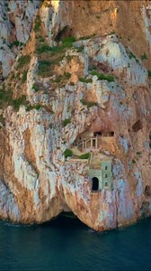 Historic Porto Flavia: Drone Views of Sardinia’s Stunning Cliffs.