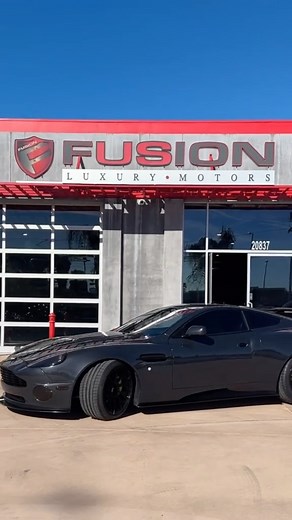 This 2002 Aston Martin Vanquish Coupe boasts a robust 5.9-liter V12 engine with 450 horsepower and 400 lb-ft of torque for an exhilarating 0-60 mph acceleration of approximately 4.5 seconds. #astonmartin #vanquish #sportscars #luxurycars #astonmartinvantage #astonmartindbs #astonmartinvanquish #vanquishv12 #vantage #v12 #v12vanquish #v12vantage | Fusion Motor Company