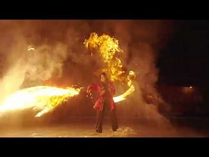 Fiery Sword Dance: Beautiful Woman Performs Mesmerizing Martial Arts