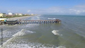 Daytime Cocoa Beach Pier aerial video, Cape Canaveral, Florida