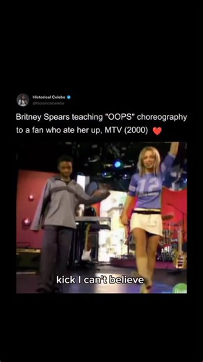 Celeb history | Past & Facts on Instagram: "This moment happened during Britney Spears’ Piece of Me show in 2015. A fan named David was picked from the audience because he was super into the “Oops!… I Did It Again” dance and could actually perform it really well. Britney, impressed by his moves, decided to give him a mini dance lesson right there on stage. She guided him through some of the iconic choreography, showing off her signature style while having fun with the whole interaction. The crow