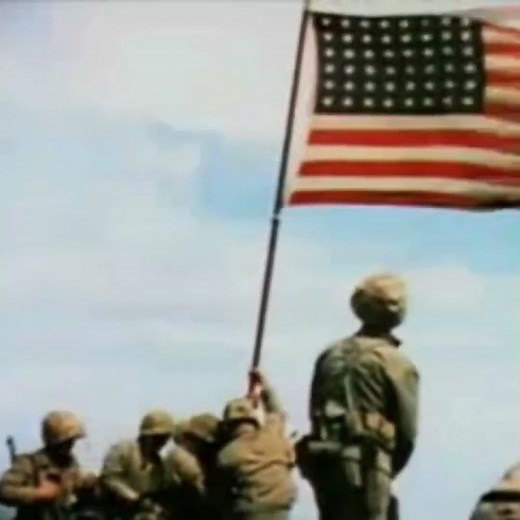 US soldiers raising flag on Iwo Jima for the 1st time